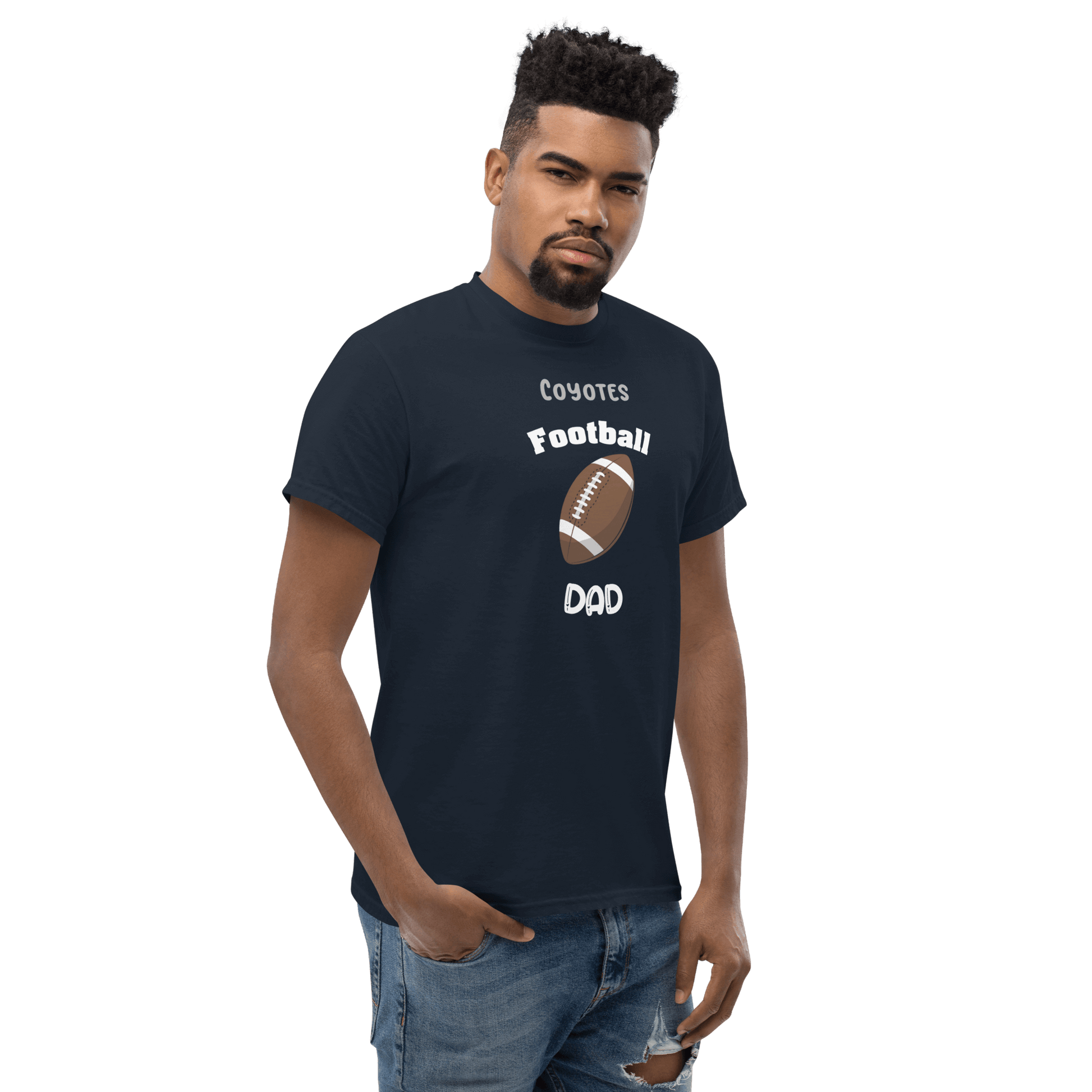 Man wearing a personalized navy football dad tee with 'Coyotes Football' text.
