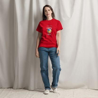 Woman wearing a red custom volleyball parent tee with Wolves logo, styled for game day support.