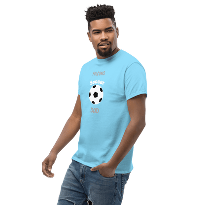 Man wearing a blue Soccer Dad tee with a soccer ball design, perfect for proud parents and fans.