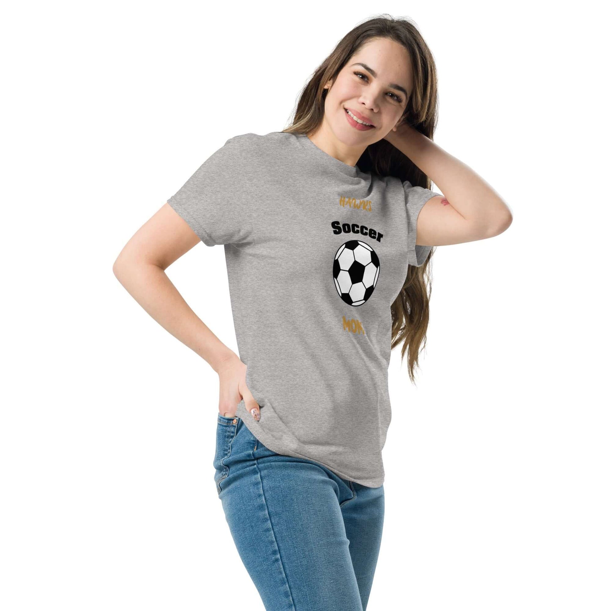 Woman wearing gray soccer parent tee with a soccer ball graphic, perfect for fans and game day support.