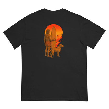 Heavyweight tee featuring a surfer and dog silhouette against a sunset beach background.