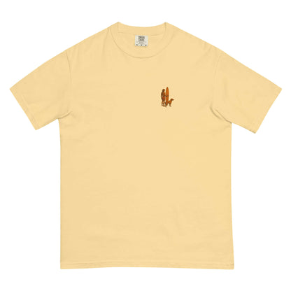 Surf Sunset Heavyweight Tee featuring minimalist surfer-and-dog silhouette in a soft yellow hue.