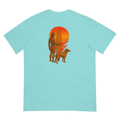 Back view of Surf Sunset Heavyweight Tee featuring a surfer and a dog against a sunset ocean backdrop.