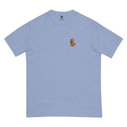 Surf Sunset Heavyweight Tee featuring a minimalist surfer and dog silhouette on a light blue background.