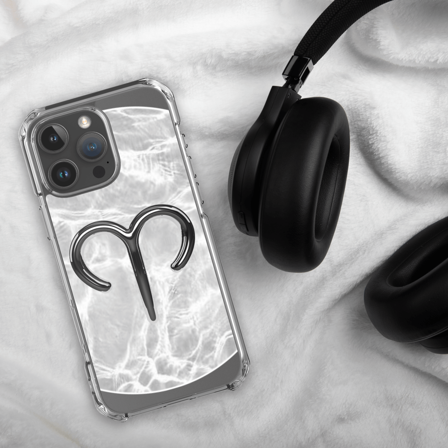 Zodiac Aries MagSafe clear iPhone case with metallic design on marble background, featuring raised bezels and sleek finish.