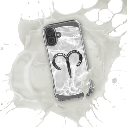 Zodiac Aries MagSafe clear iPhone case with metallic design on a marble background, splashing in white liquid.