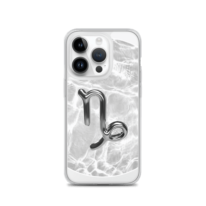 Zodiac Capricorn MagSafe clear iPhone case with metallic design over marble pattern, sleek and stylish for protection.