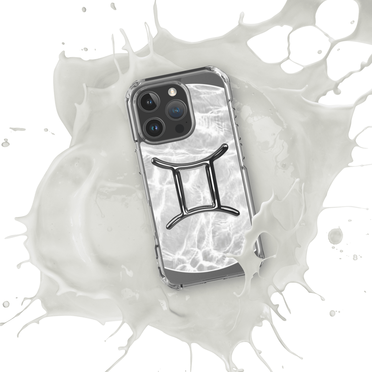 Zodiac Gemini MagSafe clear iPhone case with metallic design splashing in milk-like liquid.