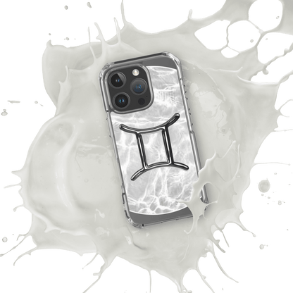 Zodiac Gemini MagSafe clear iPhone case with metallic design splashing in milk-like liquid.