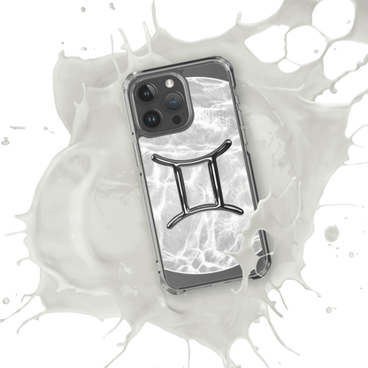 Zodiac Gemini Magsafe clear iPhone case in marble metallic design, splashing in white liquid for a cosmic style.