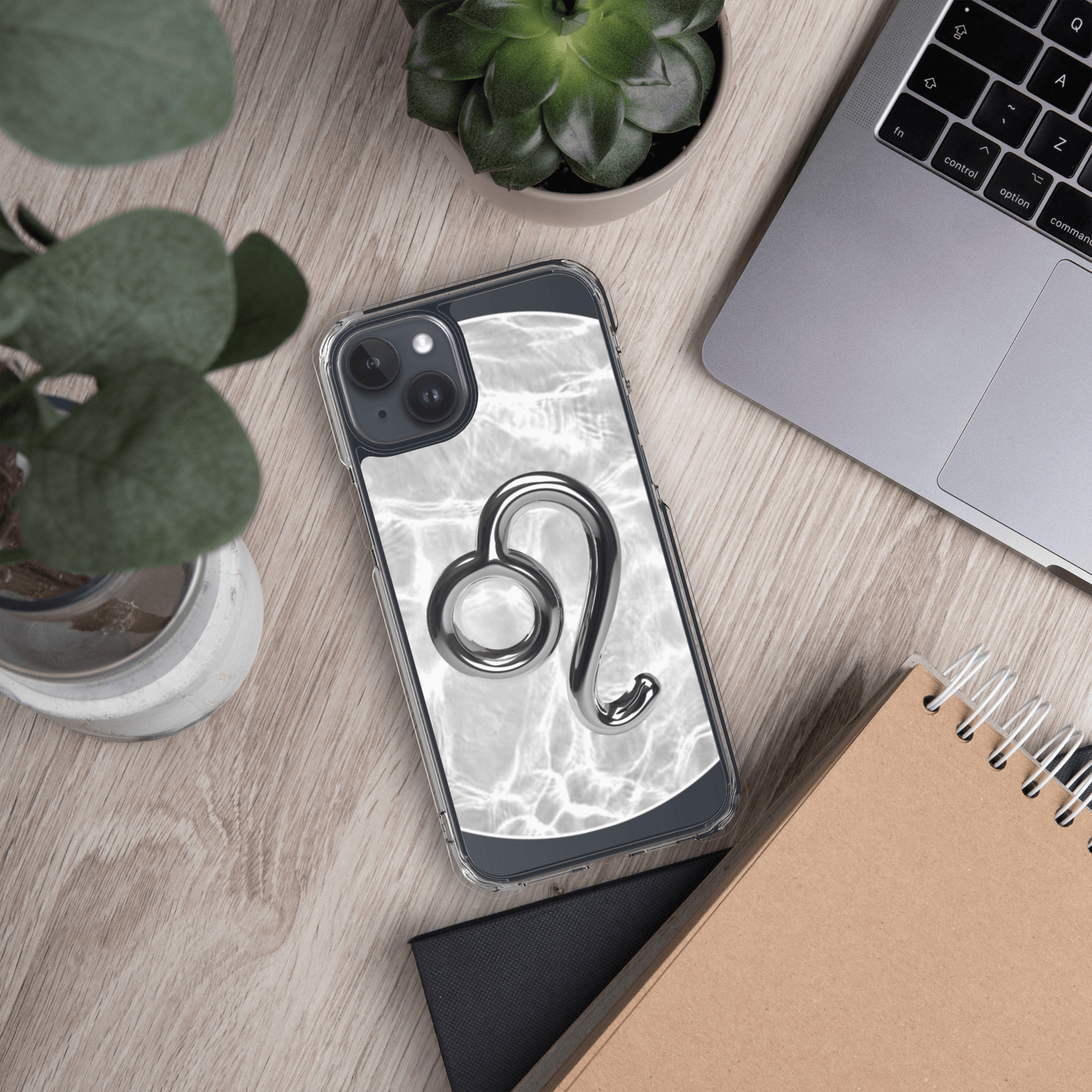 Zodiac Leo Magsafe Clear iPhone Case with metallic design on marble background, perfect for cosmic style.
