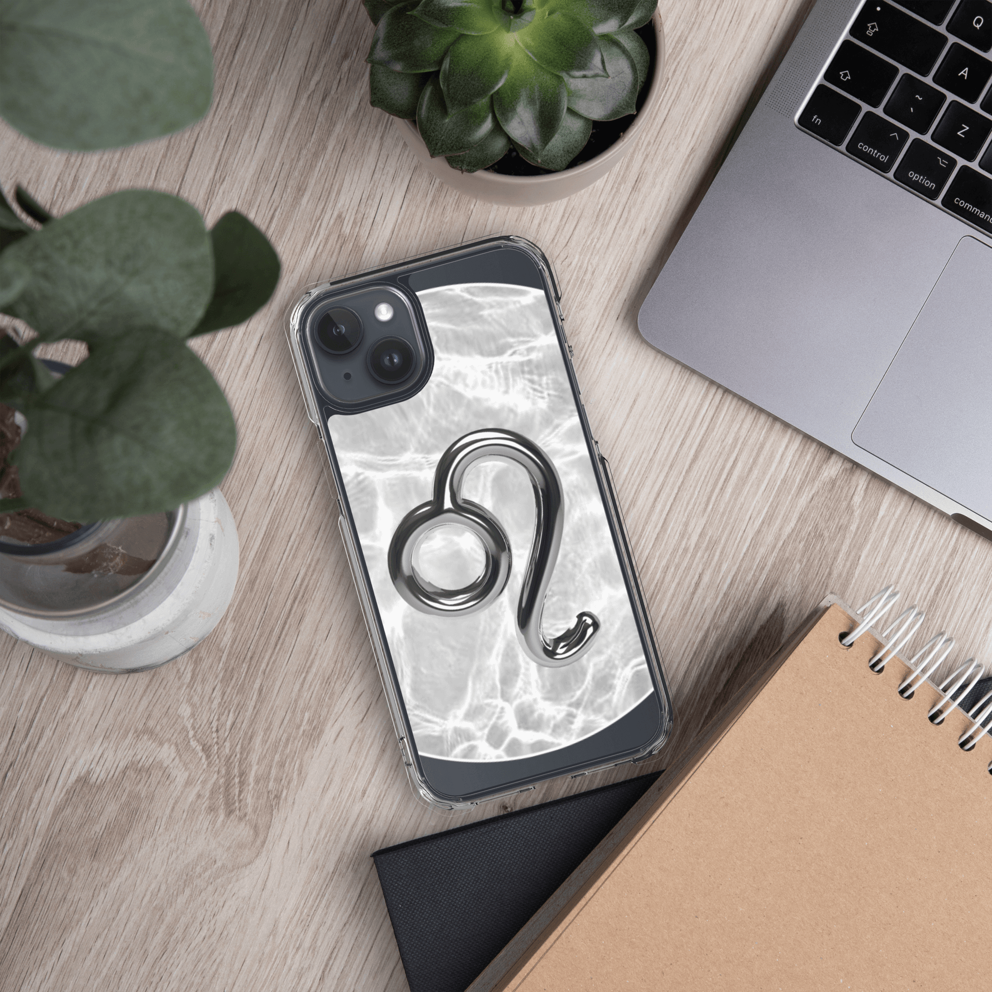 Zodiac Leo Magsafe Clear iPhone Case with metallic design on marble background, perfect for cosmic style.
