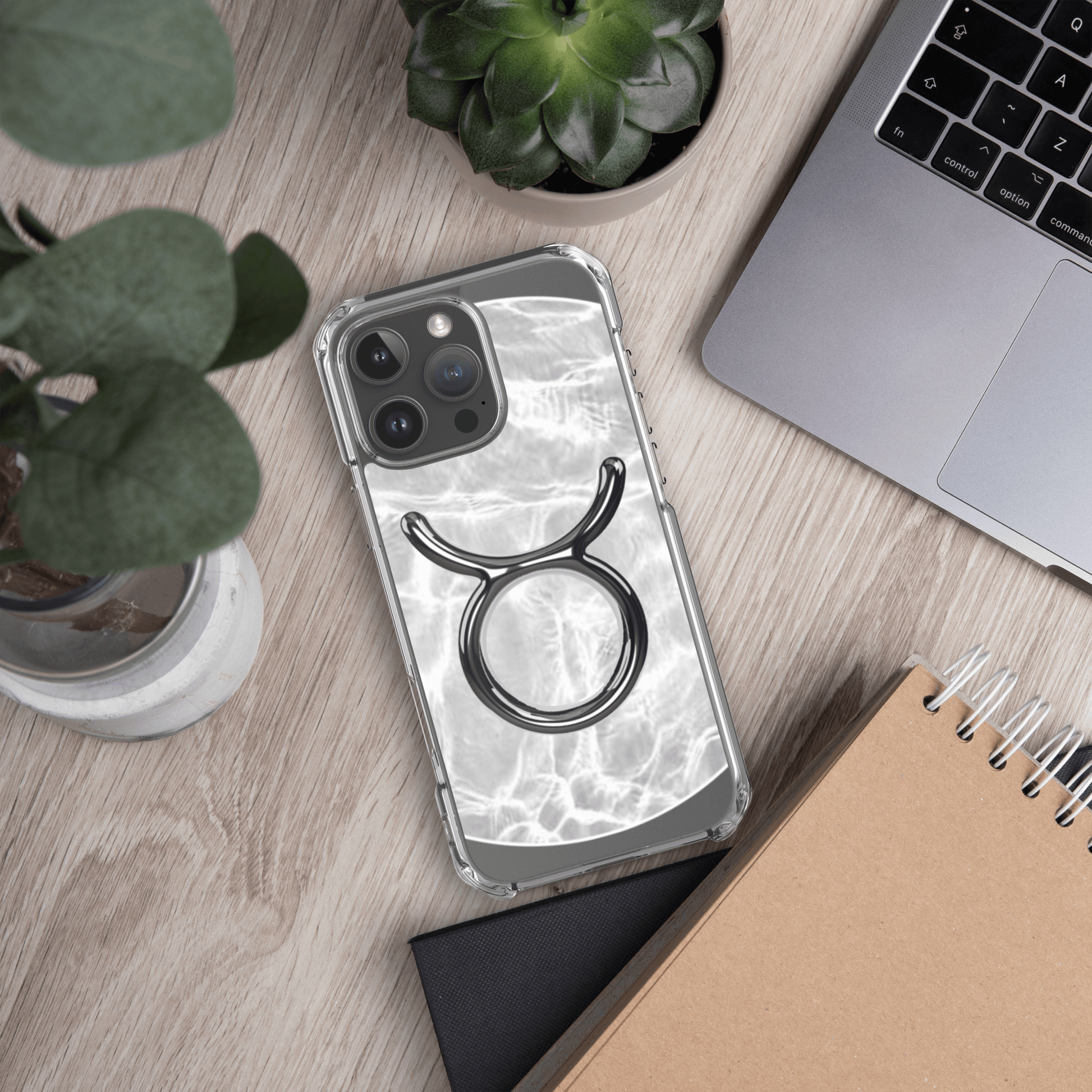 Taurus Magsafe clear iPhone case with marble design, featuring cosmic elegance and protective strength.
