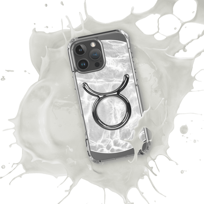 Zodiac Taurus Magsafe clear iPhone case with metallic design over marble, splashed in milk for cosmic style.