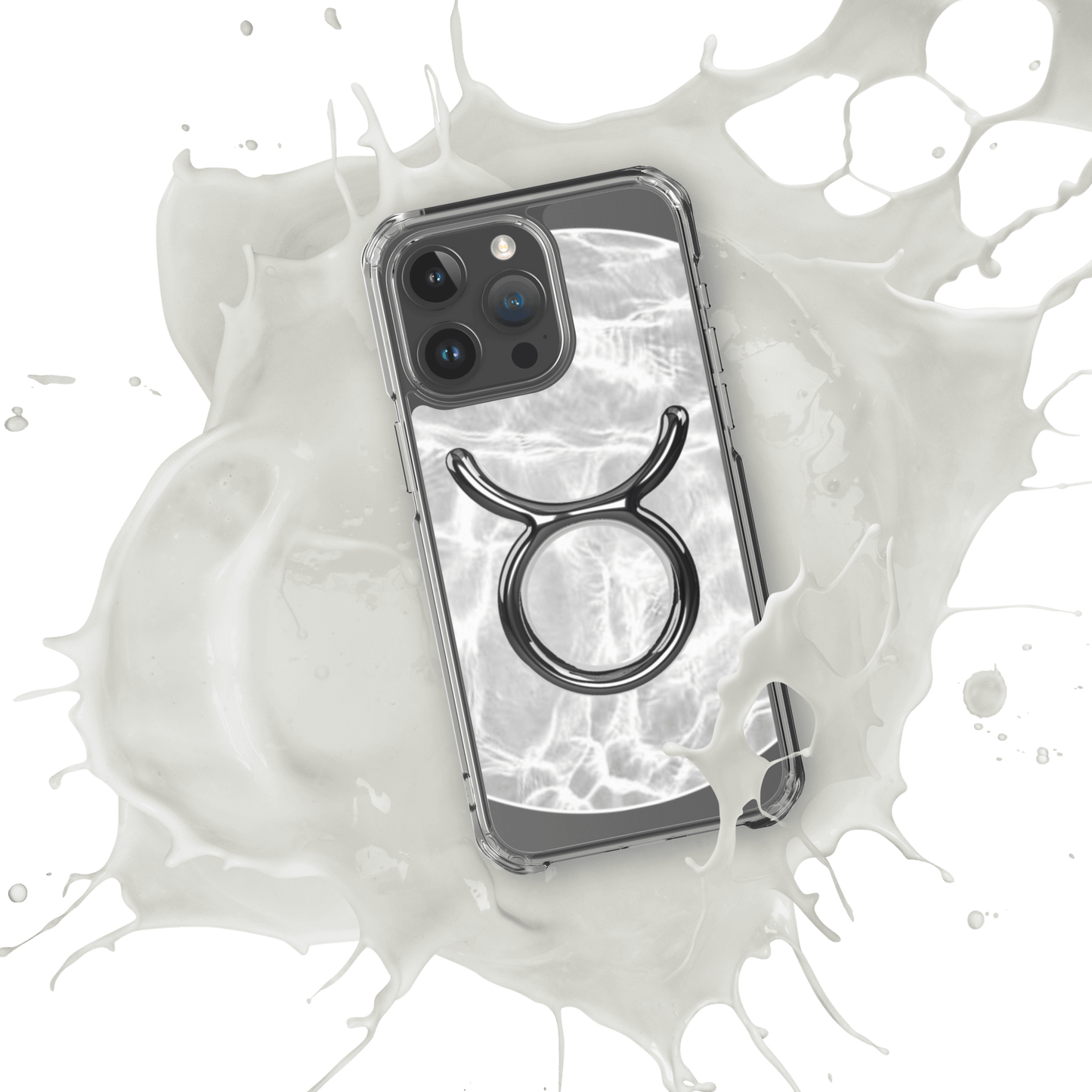 Zodiac Taurus MagSafe clear iPhone case with metallic design over marble pattern, showcasing cosmic style and protection.