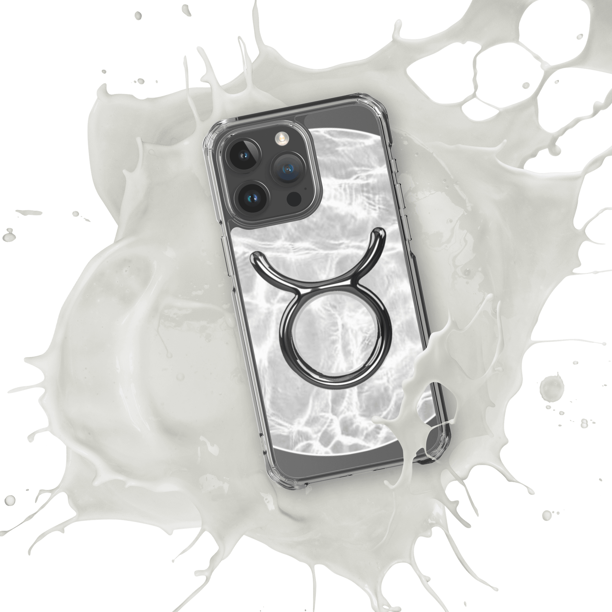 Zodiac Taurus MagSafe clear iPhone case with metallic design over marble pattern, showcasing cosmic style and protection.